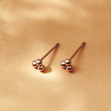 Trio dot stud earrings